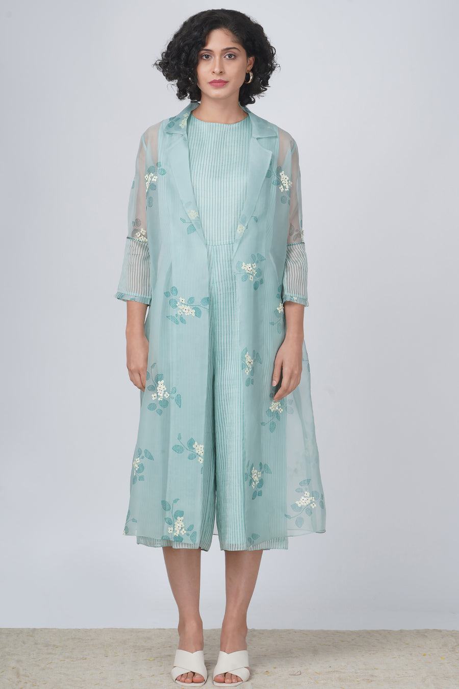 Sakura print jacket in silk organza and solid jumpsuit in stripe organza